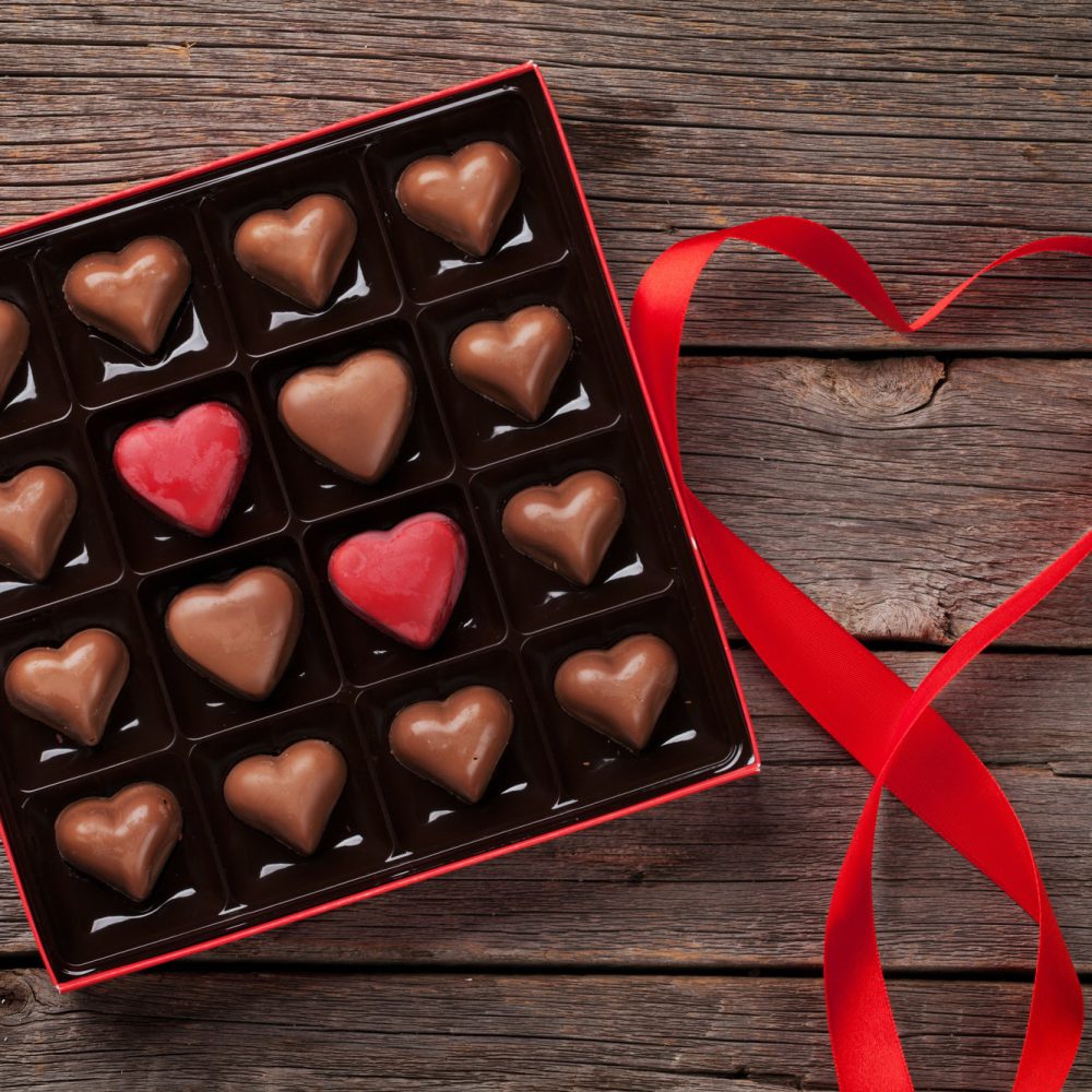 Valentines day greeting with heart chocolate box